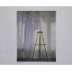 Easel in front of curtain