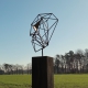 Outdoor wire sculpture - Wire Mask on a oxidised oak pedestal - unique ornament